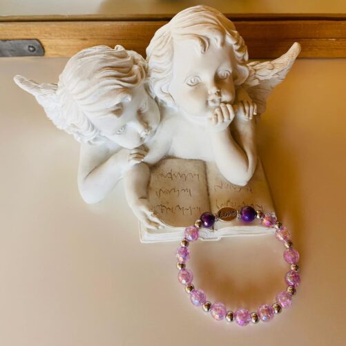 Strass-Armband mit pink-transparenten Perlen und Zierelementen